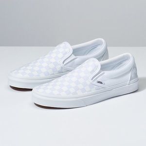 White slip on checkerboard vans